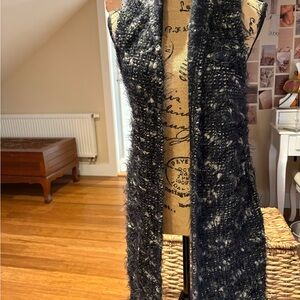 Chic Black and White Knit bi-level vest.  Long in front, short in back.